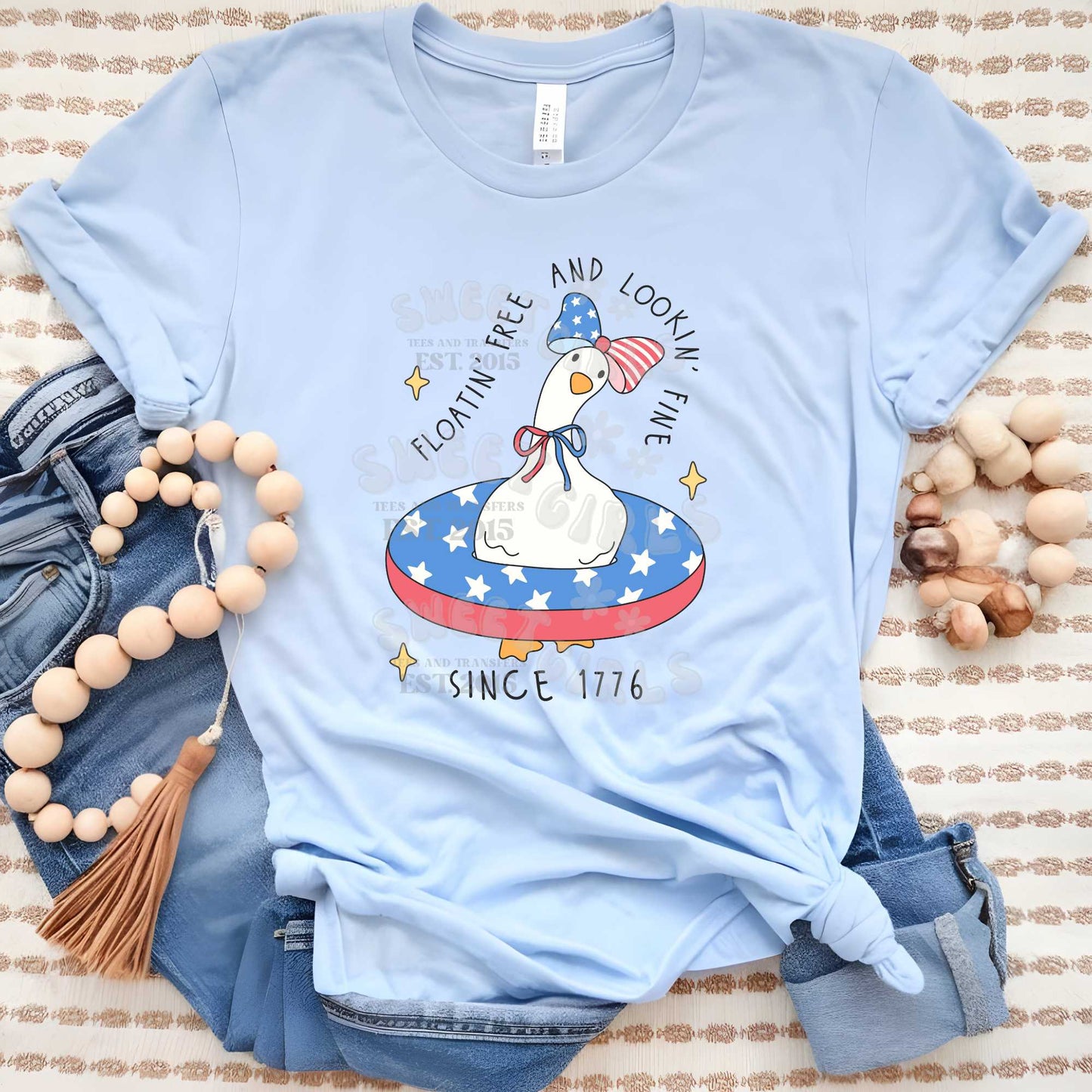 Floating Free Patriotic Goose Shirt – July 4th Duck Tube Graphic Tee – Retro USA Summer T-Shirt – Heat Transfer Iron-On for Women, Teens, and Moms