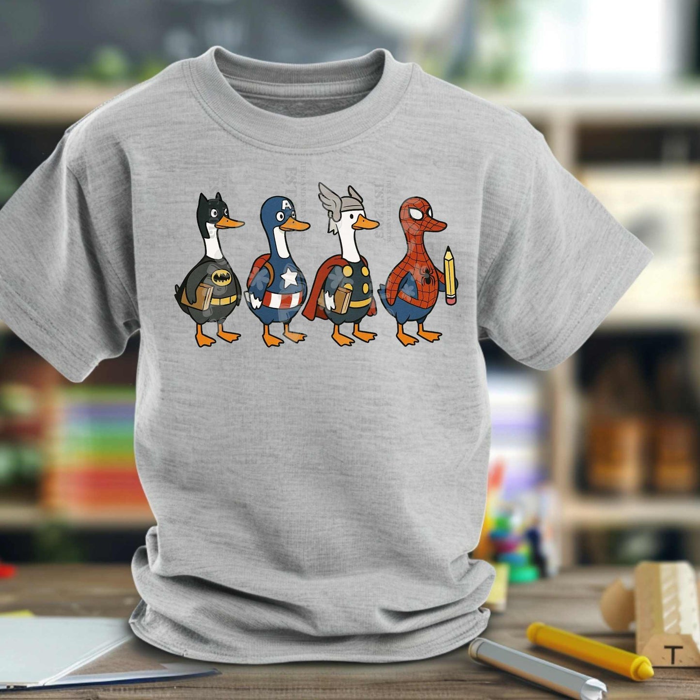 Superhero Duck DTF Heat Transfer – Fun Comic-Inspired Ducks with Capes & Masks Holding School Books – Back to School Iron-On for Kids & Adults